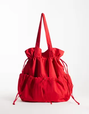 ASOS DESIGN ruched pocket tote bag in red