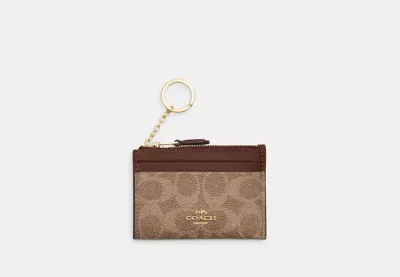 Mini Skinny Id Case In Signature Canvas